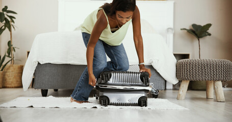 Suitcase, full and zip with woman in bedroom for travel, student exchange program and scholarship grant. Study abroad, luggage and bag with person packing at home for departure and opportunity