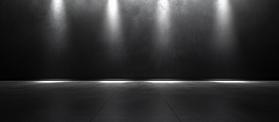 Empty modern exhibition space with dramatic lighting and polished floor, ideal for displays