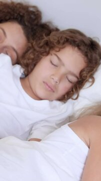 Mother and children sleeping