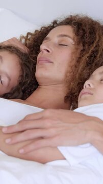Mother and children sleeping