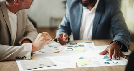 Hands, paperwork and discussion for business, colleagues and data analyst with charts for market research. Corporate, graphs and people with documents in office, teamwork and employees with info