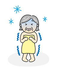 入浴前に寒さで凍えそうなシニア女性