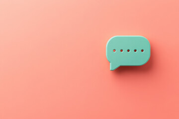 Minimalist green speech bubble on a vibrant coral background, symbolizing modern communication and digital interaction.