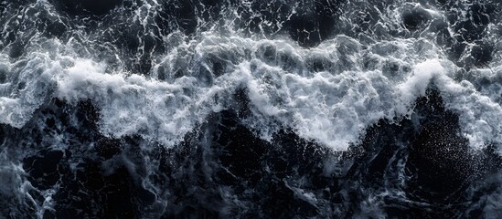 Ocean waves crashing, dark water, foam