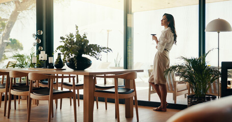 Break, thinking and woman with wine, home and calm with alcohol in apartment, relax and living...