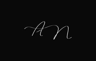 A minimal yet stylish depiction of white cursive lettering forming AN on a dark background, symbolizing elegance and simplicity.