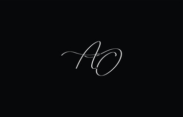 A minimal yet stylish depiction of white cursive lettering forming AO on a dark background, symbolizing elegance and simplicity.
