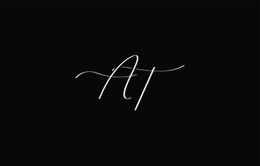 A minimal yet stylish depiction of white cursive lettering forming AT on a dark background, symbolizing elegance and simplicity.