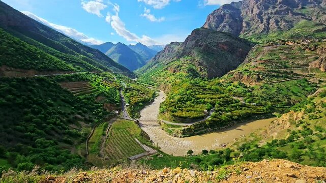 Scenic Sirwan River winding through lush mountain valleys under a clear sky.
📍Zhivar, Hawraman Takht - Kurdistan