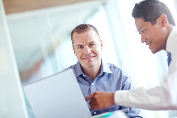 Obraz premium Employees, laptop and team portrait for human resources in office, review candidates and applications. Men, discussion and collaboration with hiring recruitment process, online and advice for project