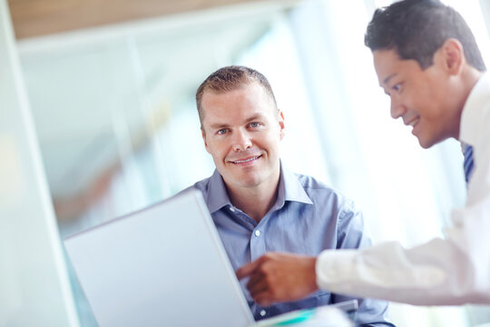 Employees, laptop and team portrait for human resources in office, review candidates and applications. Men, discussion and collaboration with hiring recruitment process, online and advice for project