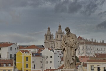 The statue of St. Vincent, at the viewpoint of Santa Luzia over the tajo river in Lisbon.