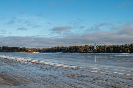 Winter Landscape with river and Temple on the far riverbank.