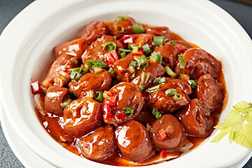 Braised spicy pig tail in casserole