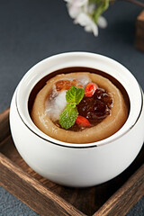 Stewed Pear with Snow Clam, Bird's Nest, Peach Gum and Rock Sugar