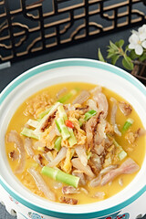 Braised Pig's Pig's Tail with Pickled Cabbage and Young Bamboo Shoots