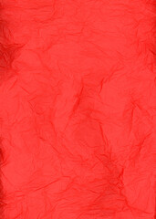 Fototapeta premium Red crumpled tissue paper texture background detail