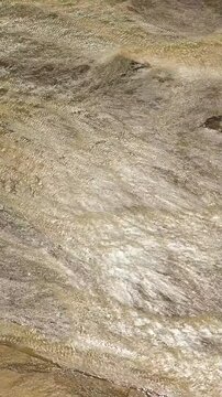 Aerial view of Low water level in Bucao river, effect of drought. Luzon, Philippines. Vertical video.