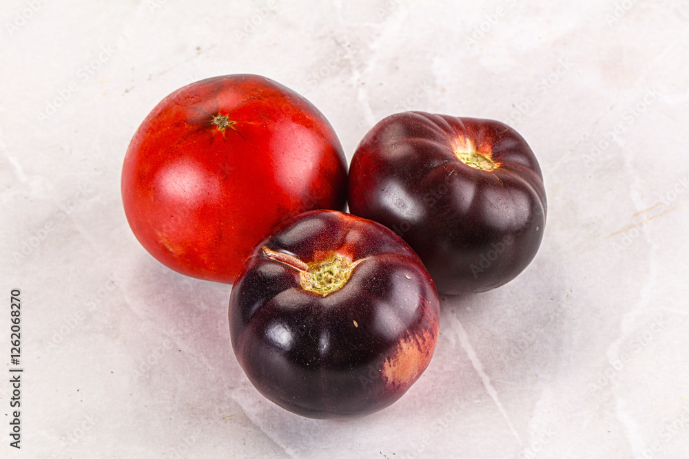 Poster Black ripe juicy organic tomato