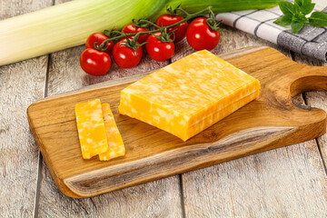 Marble yellow cheese with slices