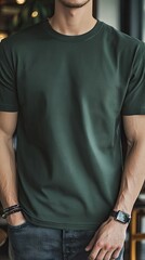 A man wearing forest green color t shirt mockup; with bracelet; at the cafe; front view