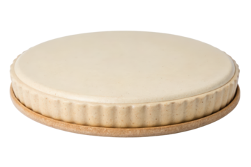 A beige ceramic tart pan with fluted edge isolated with transparent background