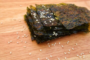 Nori made from dried edible seaweed, close-up.