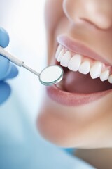 Oral health checkup with dentist examining teeth using mirror and probe in dental clinic, promoting smile and hygiene for patients.