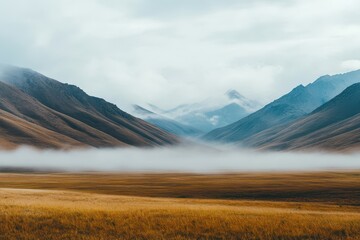 Heavy fog blankets the valley, creating a serene atmosphere over the rugged mountains at dawn, Lockdown shot of heavy fog filling the sky over the rolling mountains