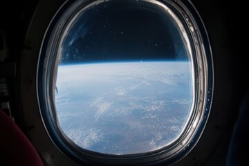Fototapeta premium View of Earth from a spacecraft drifting into outer space, Drifting out into outer space as viewed through a space vehicle window