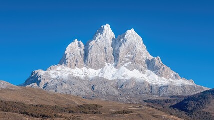 Majestic Mountain Peak Under Clear Sky