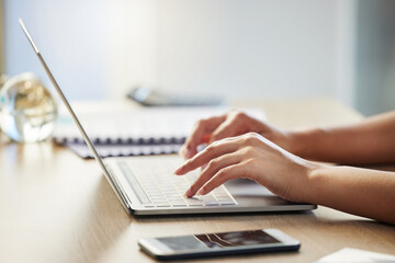 Woman, hands and typing on laptop at desk, email business contact and editing proposal in office....