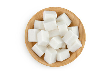 Sugar cubes in a wooden bowl isolated on white background. Top view. Flat lay