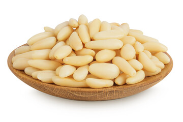 Shelled European pine nuts in wooden bowl isolated on white background with full depth of field