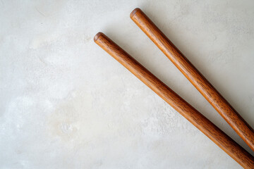 The Grace of Smooth Wooden Chopsticks on a Neutral Canvas.