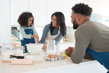 Parents, daughter and happy for baking in kitchen with mixing ingredients, bonding together or cake recipe. Love, african people and cooking with dessert preparation, development and learning support
