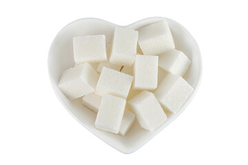 Sugar cubes in a ceramic bowl isolated on white background. Top view. Flat lay
