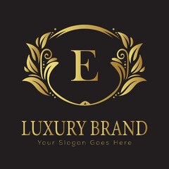 Luxury Gold Floral Letter Logo Design with Flourishes
