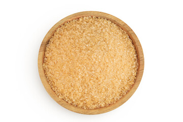 The brown sugar in wooden bowl isolated on white background. Top view. Flat lay