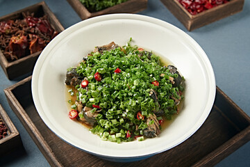 Black-bone chicken with scallion, rice and pepper