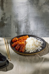 fried chicken in garlic sauce with rice