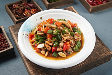 Braised scallops with bell pepper, okra, seafood and mushrooms
