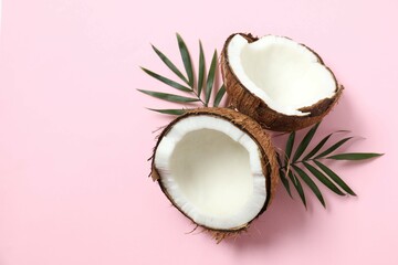 Coconut on color background, top view
