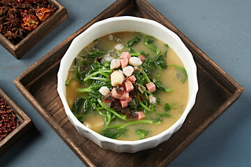 Shrimp soup with basil, ham, preserved egg and spinach
