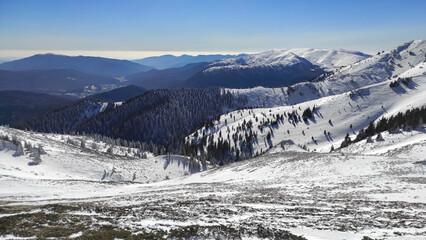  Winter landscape , high up in the Ciucas Mountains  , part of the Carpathian range in Romania, Eastern Europe.