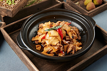 Stir-fried pork belly with black bean, bell pepper and king oyster mushroom slices