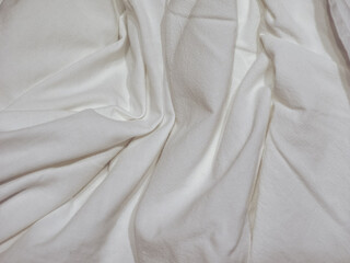crumpled white cotton fabric texture background