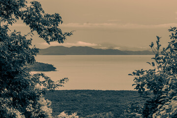 Panoramic nature background of the landscape with views of mountains, sea, trees and fishermen's...