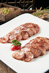 Delicious Sichuan-style smoked spicy sausage slices