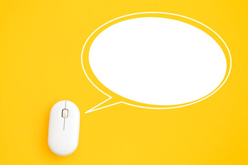 For communication concept, top view of white  mouse with blank white speech bubble shape ,copy...